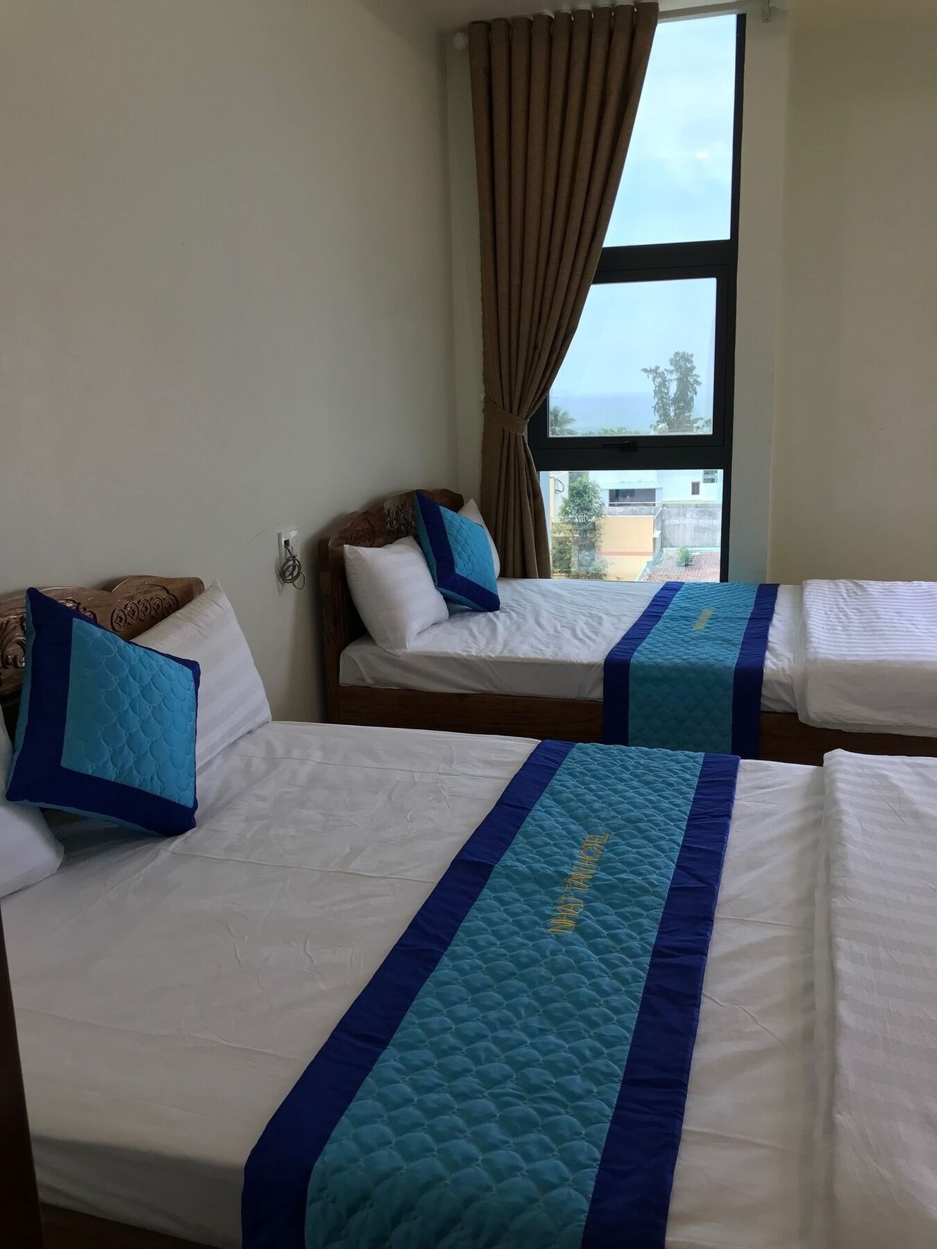 Nhat Tan Hotel Куинён Экстерьер фото
